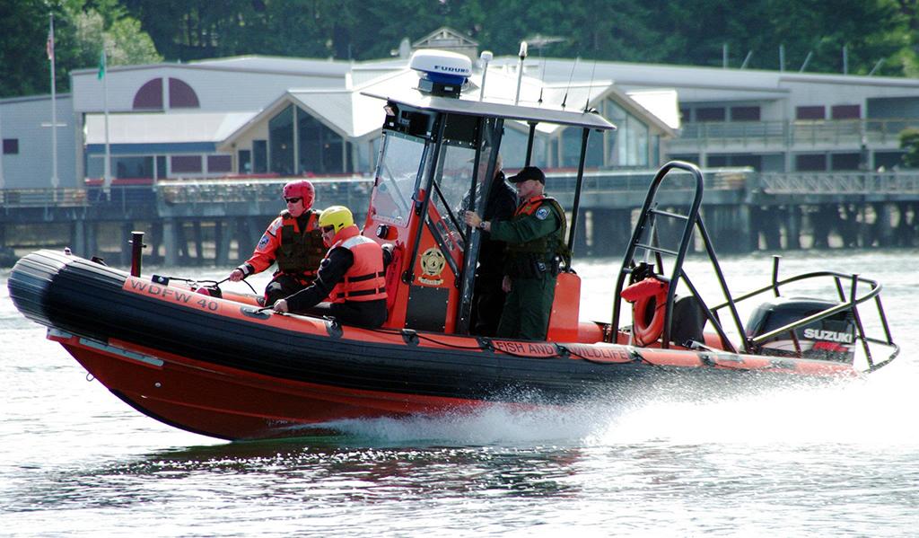 WDFW Enforcement Personnel on Speed Boat