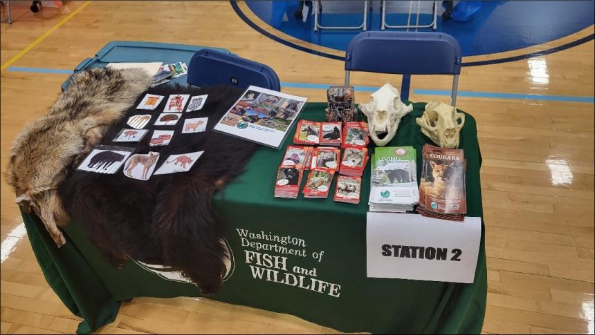 Station with educational and interpretive materials for fourth graders at Ridgefield Elementary School