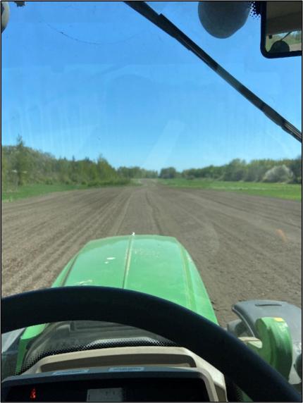 View of pea planting operations from the tractor driver’s seat.