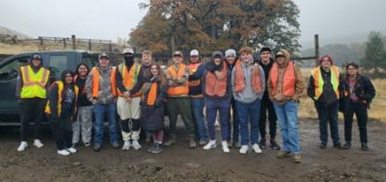 Naches Valley High School seniors and staff members present at the Oak Creek Wildlife Area community service project.